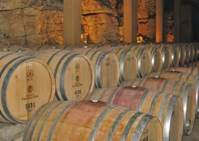 French Riviera Wine Tours - At Château Vignelaure, Coteaux d’Aix-en-Provence, the wine aging room 700x467