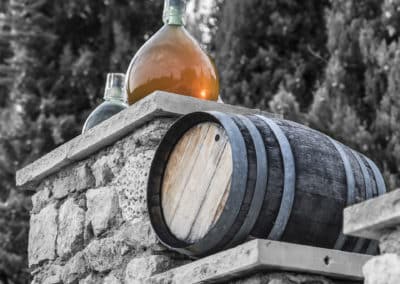 French Riviera Wine Tours - Demijohns and barrel in Bellet